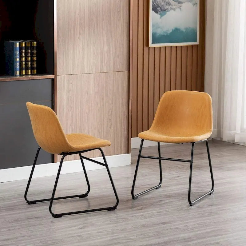 Mid-Century Tan Faux Leather Armless Dining Chair with Black Metal Sled Base
