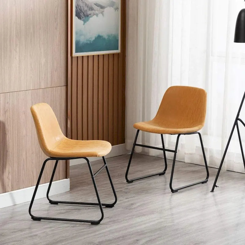 Mid-Century Tan Faux Leather Armless Dining Chair with Black Metal Sled Base