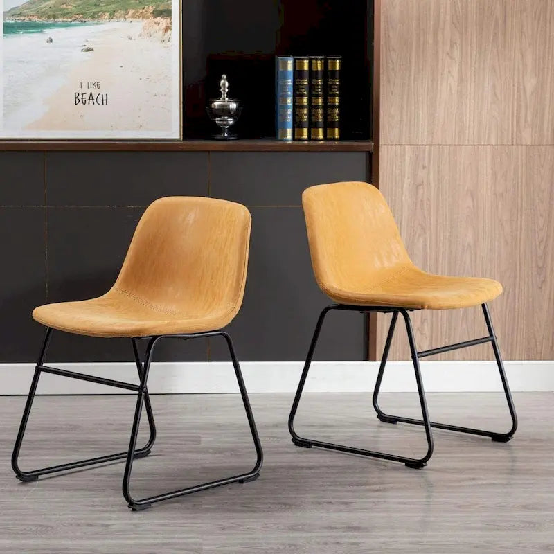 Mid-Century Tan Faux Leather Armless Dining Chair with Black Metal Sled Base