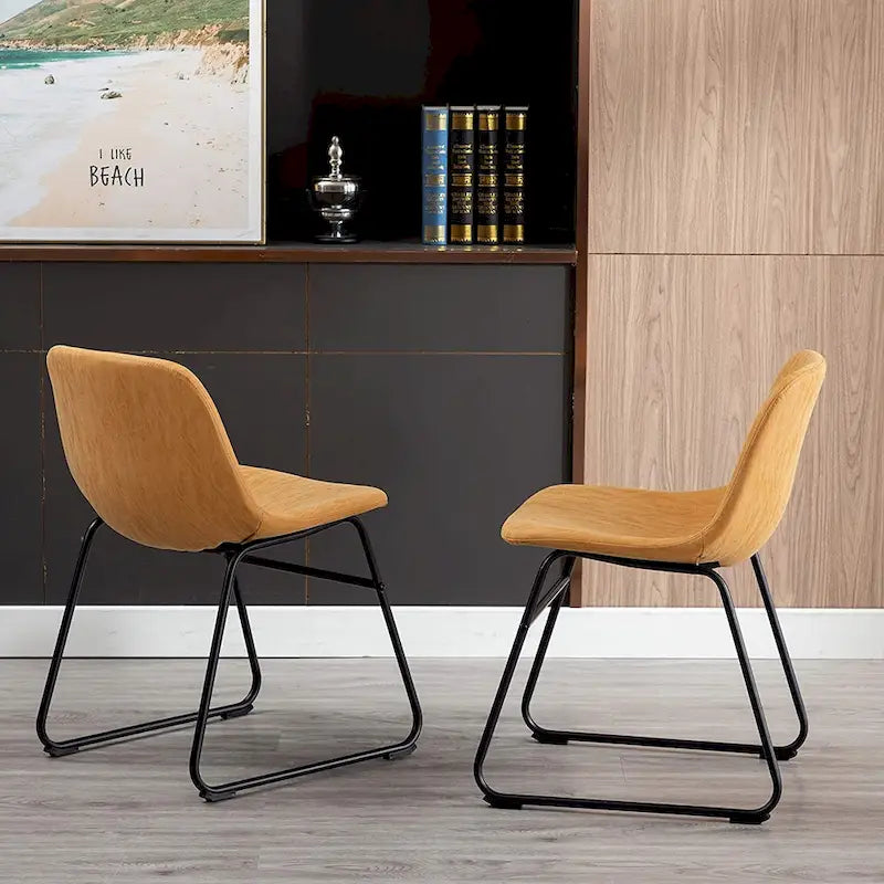 Mid-Century Tan Faux Leather Armless Dining Chair with Black Metal Sled Base
