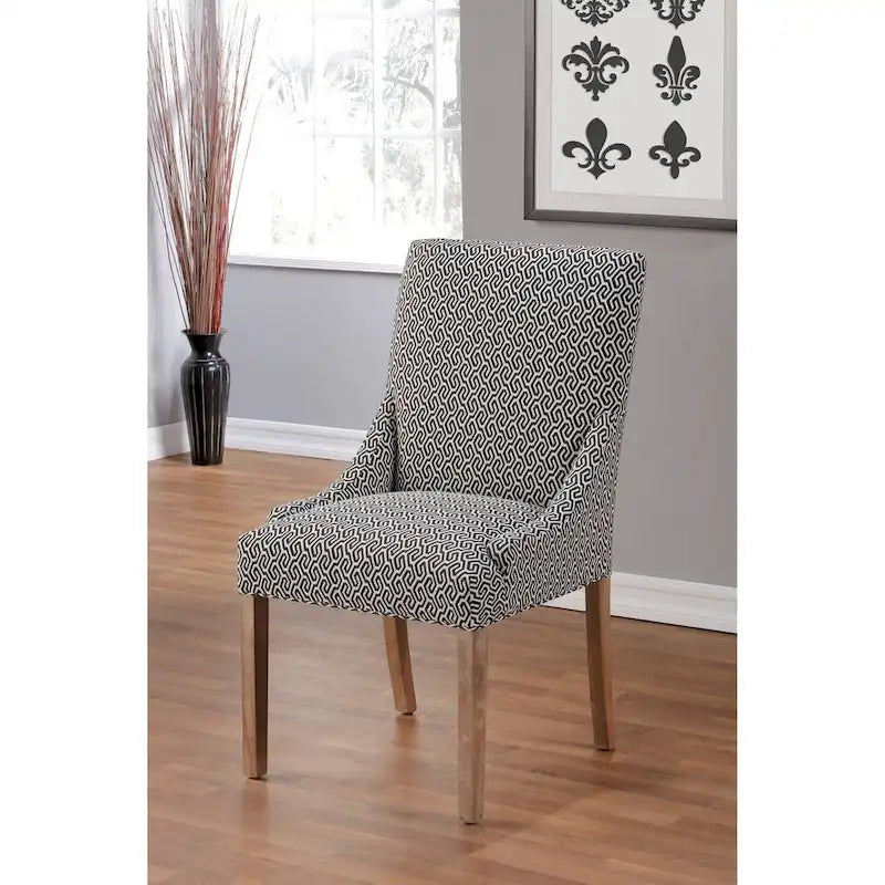 Silla de comedor tapizada con brazos de diseño transicional, patas de caucho y tela estampada