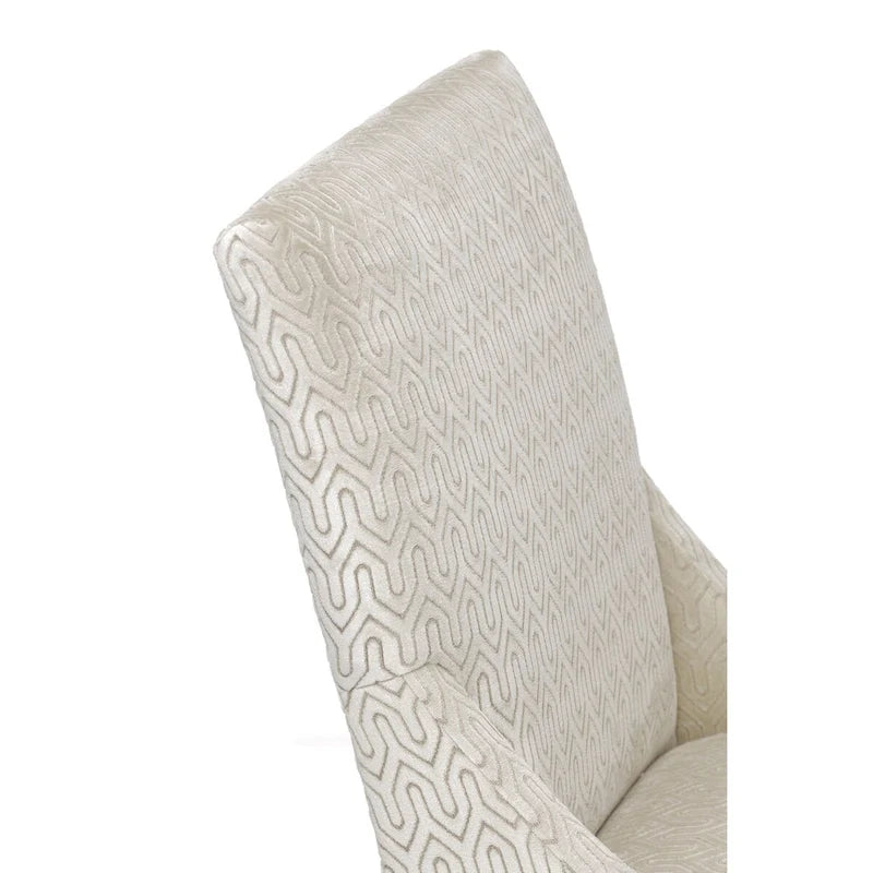 Silla de comedor tapizada con brazos de diseño transicional, patas de caucho y tela estampada